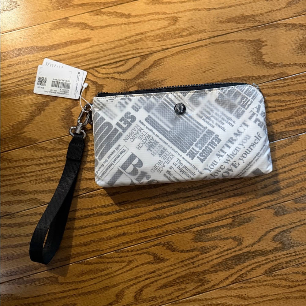 Lululemon Black and White Zipper Wristlet, Manifesto Print